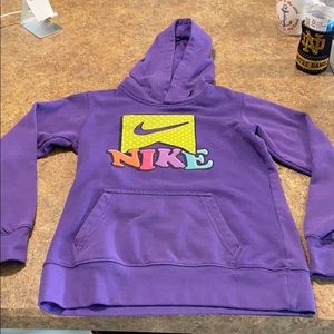 A kids large purple nike sweatshirt
